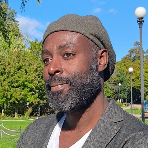 Headshot of Junior Asante